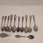 Sold 3/25/25 Rolex and other small silver plate spoons  would be cool turned into jewelry